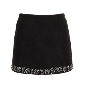 minigonna con gioiello e strass