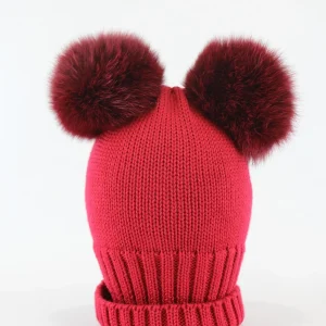 berretto con doppio pompon