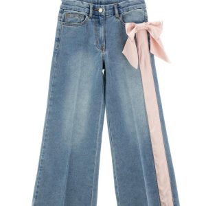 Jeans con fiocco applicato